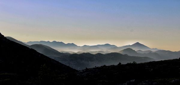 Scenic view of mountains against clear sky