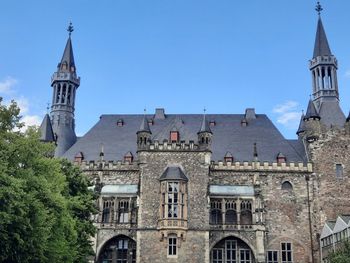 Low angle view of old building against sky