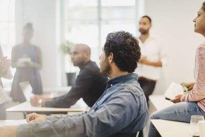 Multi-ethnic students concentrating in language class