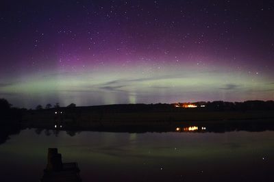 Scenic view of lake at night