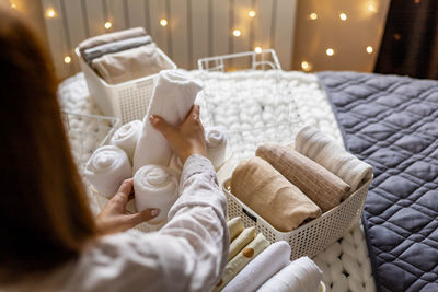 Close-up of baby boy lying on bed at home