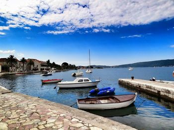 Boats moored in sea