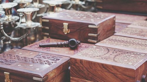 Close-up of wooden boxes on table