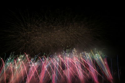 Firework display at night