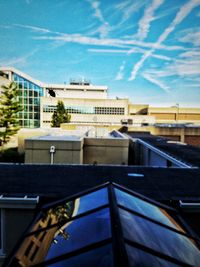 High section of building against blue sky