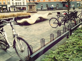 Bicycle parked in front of building