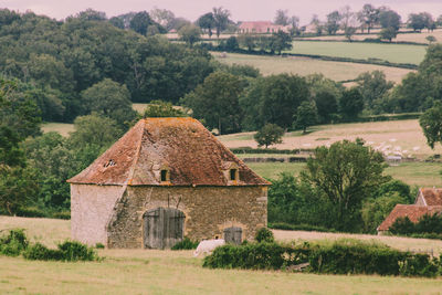 Old stone barn in a field in brionnais in burgundy