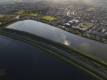 High angle view of river amidst buildings in city