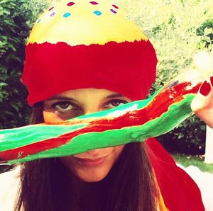 Close-up portrait of smiling young woman