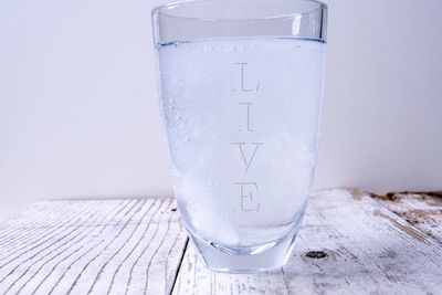 Close-up of glass of water on table