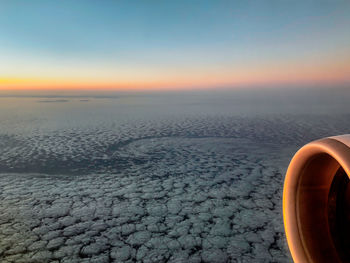 Scenic view of seascape against sky during sunrise