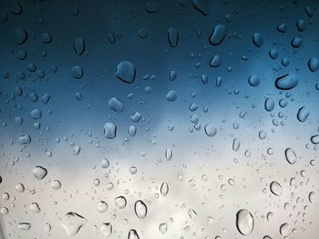 Close-up of water drops on glass