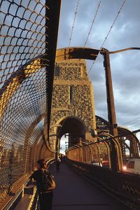 View of bridge against cloudy sky