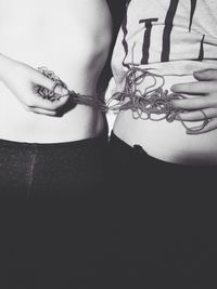 Cropped image of woman holding hands