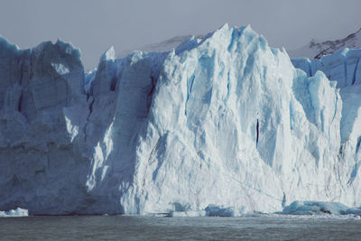 Scenic view of frozen sea against sky