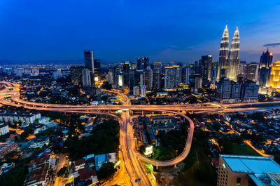 High angle view of illuminated city at night