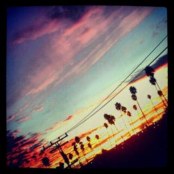 Low angle view of cloudy sky at sunset