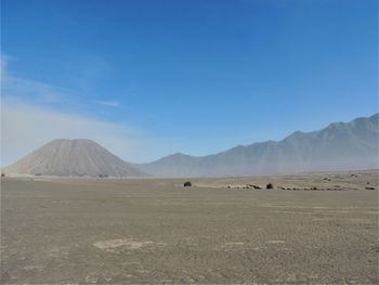 Scenic view of desert against sky