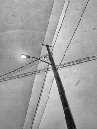 Low angle view of street light against sky