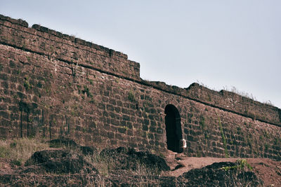 Low angle view of historical building against clear sky