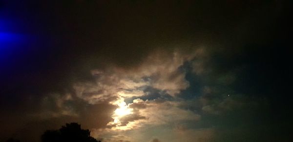 Low angle view of clouds in sky during sunset