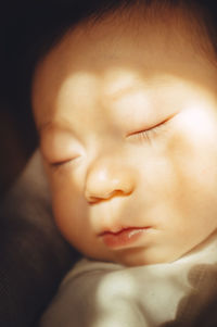 Close-up of cute baby sleeping