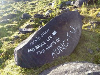 Close-up of text on cemetery