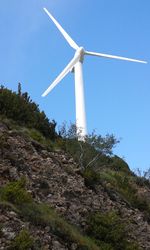 Wind turbine with wind turbines in background