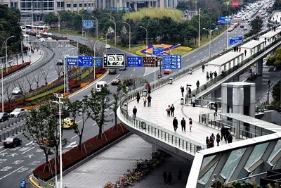 High angle view of people on road in city