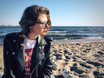 Beautiful young woman on beach