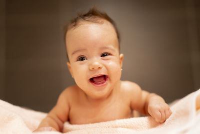 Happy little girl after bath