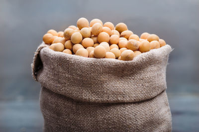 Close-up of soybeans in canvas bag
