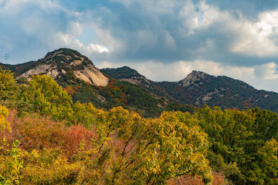 Scenic view of mountains against sky during autumn