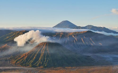 Panoramic view of volcanic landscape against sky