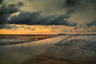 Scenic view of sea against sky during sunset