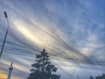 Low angle view of street light against sky