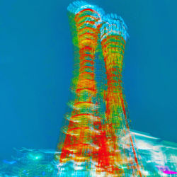 Digital composite image of sea against clear blue sky