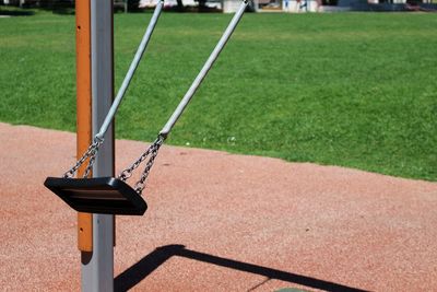 High angle view of empty swing at playground