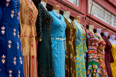 Multi colored hanging at market stall