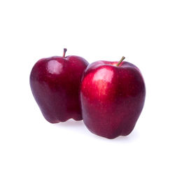 Close-up of apple against white background