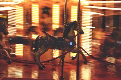 Side view of horse at night