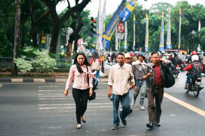 People walking on city street