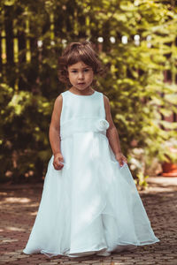 Portrait of a girl standing outdoors