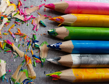 High angle view of multi colored pencils on table