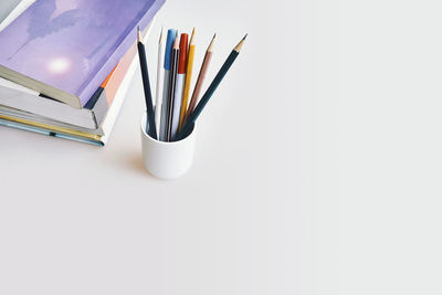 High angle view of colored pencils on table
