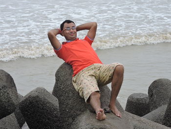 Portrait of young man on beach