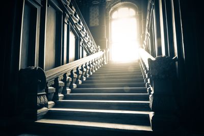 Sunlight falling on steps in historic building