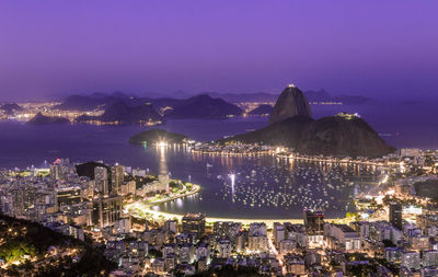 High angle view of sugarloaf mountain  lit up at night. rio de janeiro