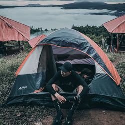 People sitting in tent