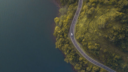 High angle view of winding road on landscape